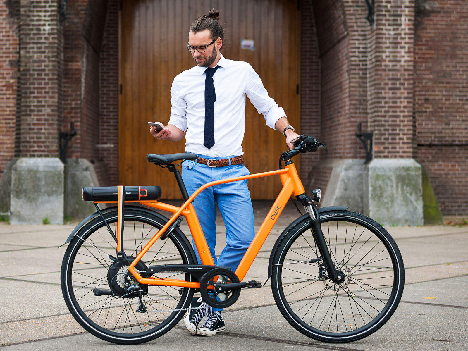 man met fiets qwic